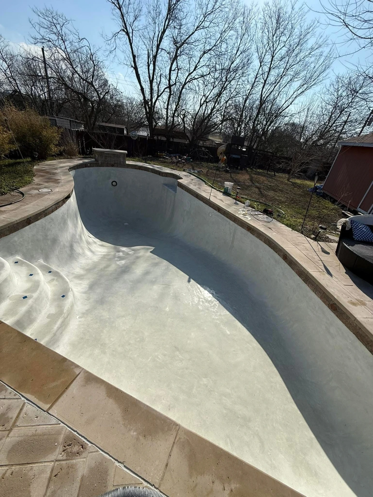 Freshly plastered pool shell with a smooth new finish
